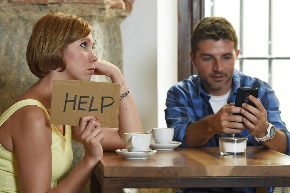 man ignoring wife