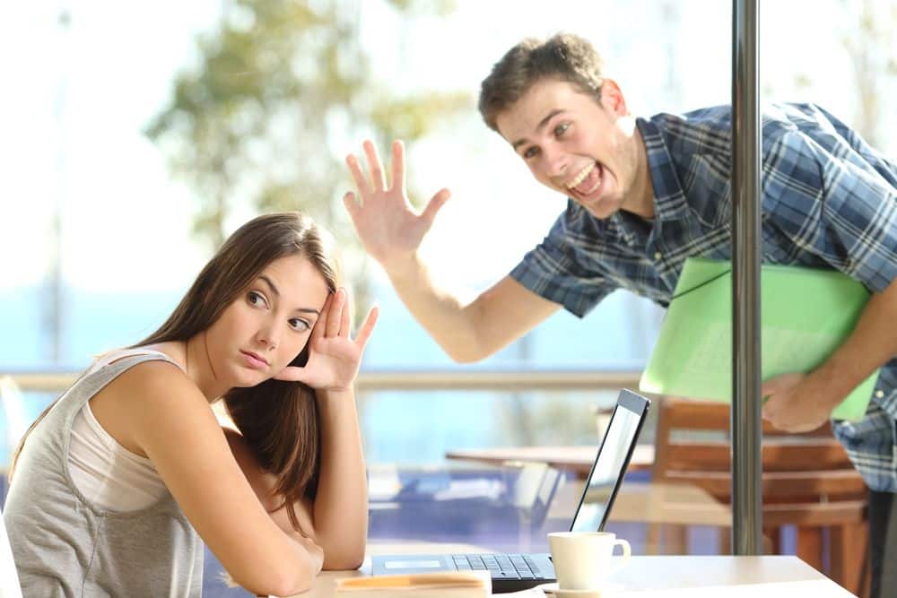 woman ignoring man