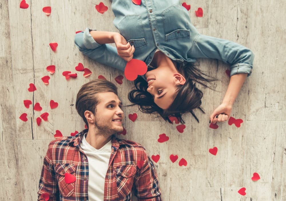 Couple sitting together and laughing