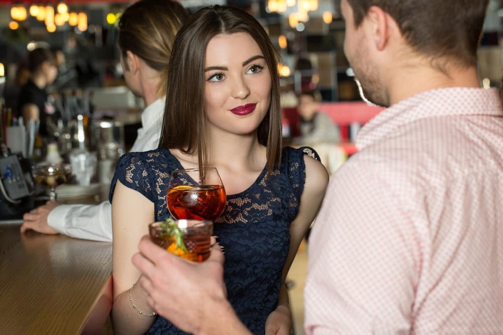 woman flirting with a man
