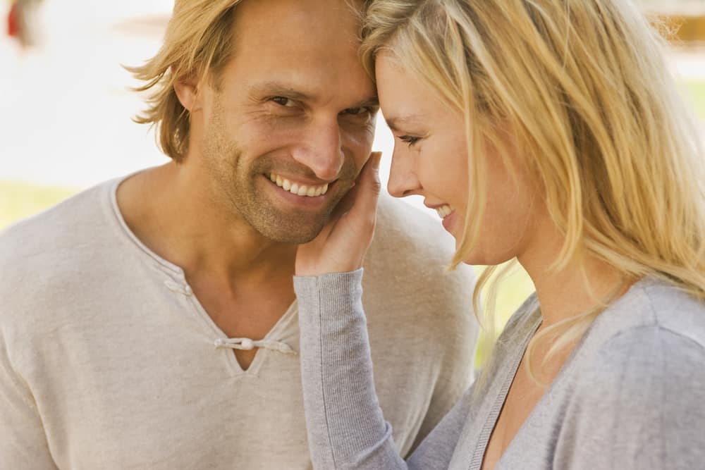 woman touching man