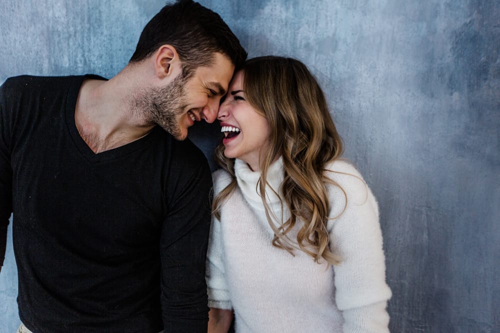 happy couple big laugh