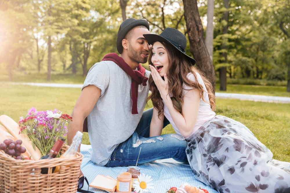 woman man talking picnic