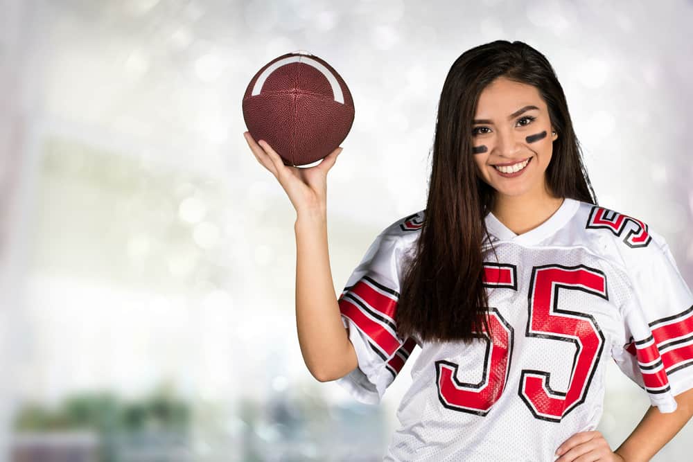 woman in a football gear