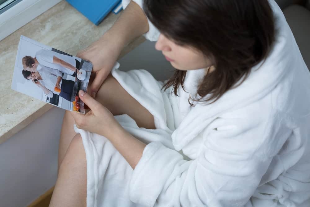 woman looking on ex photo