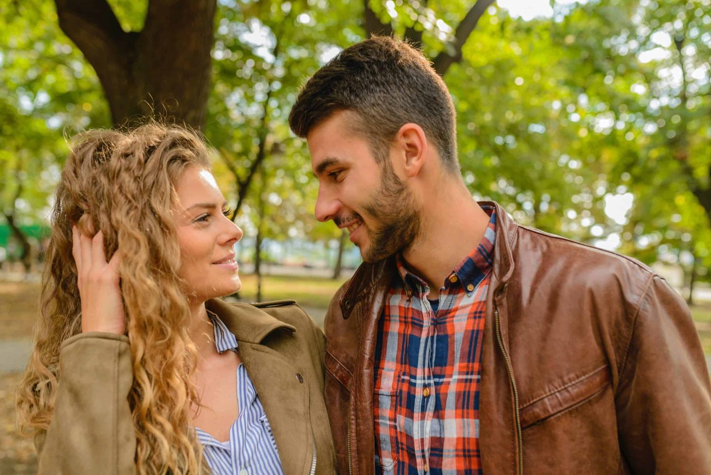 Man and woman staring into each others eyes and smiling