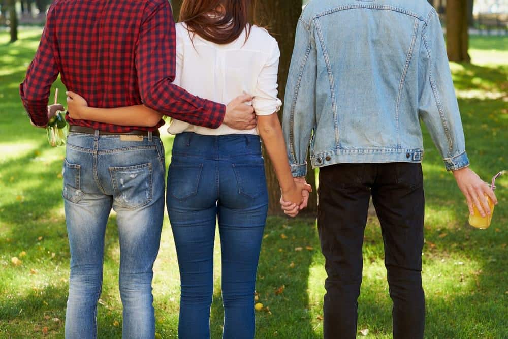 holding hands couple and hug friend