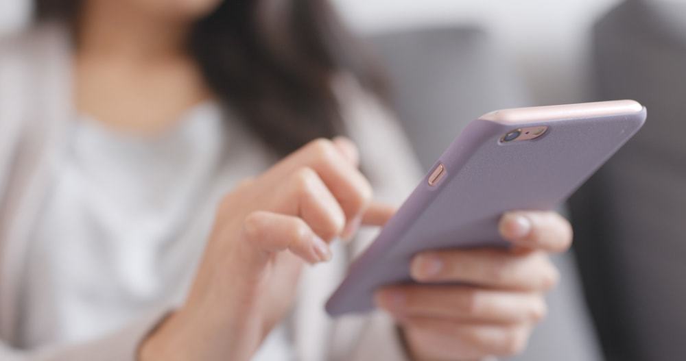 woman texting phone