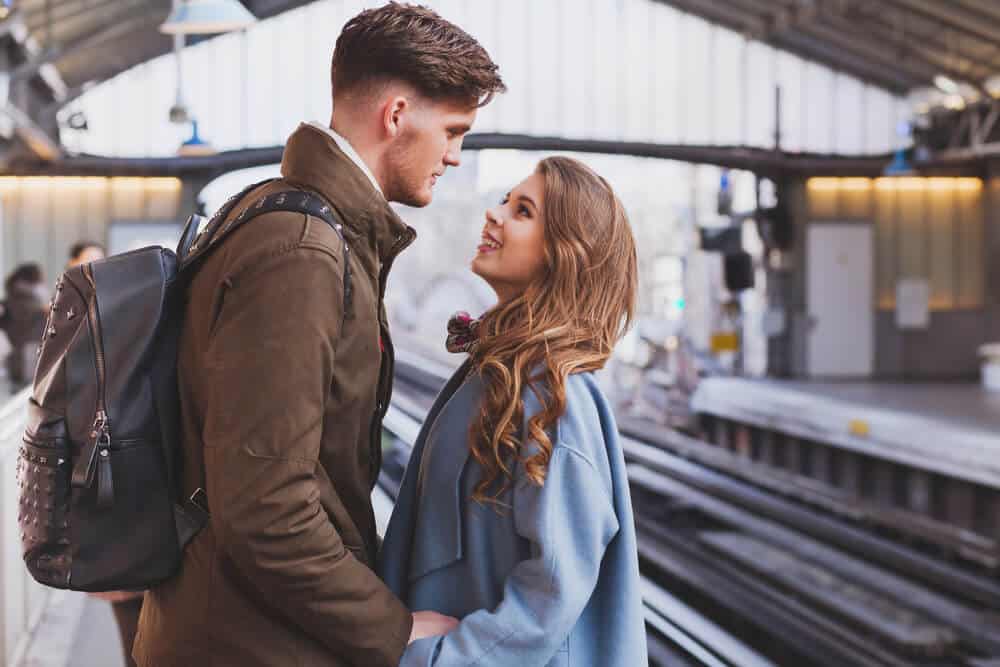 lovely couple in a train station