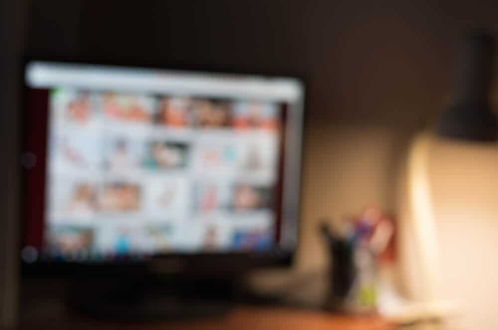 blurry adult's content on screen