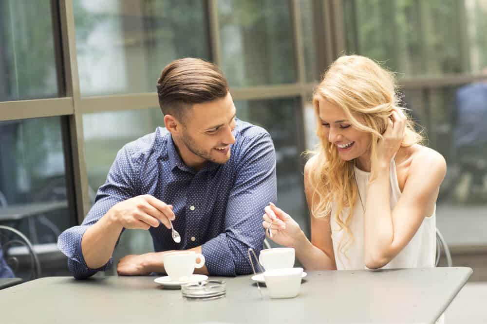 Beautiful couple having coffee