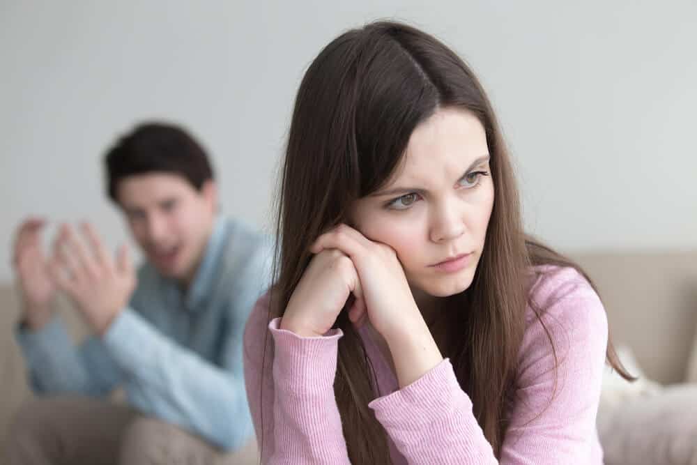 Man shouting woman ignores