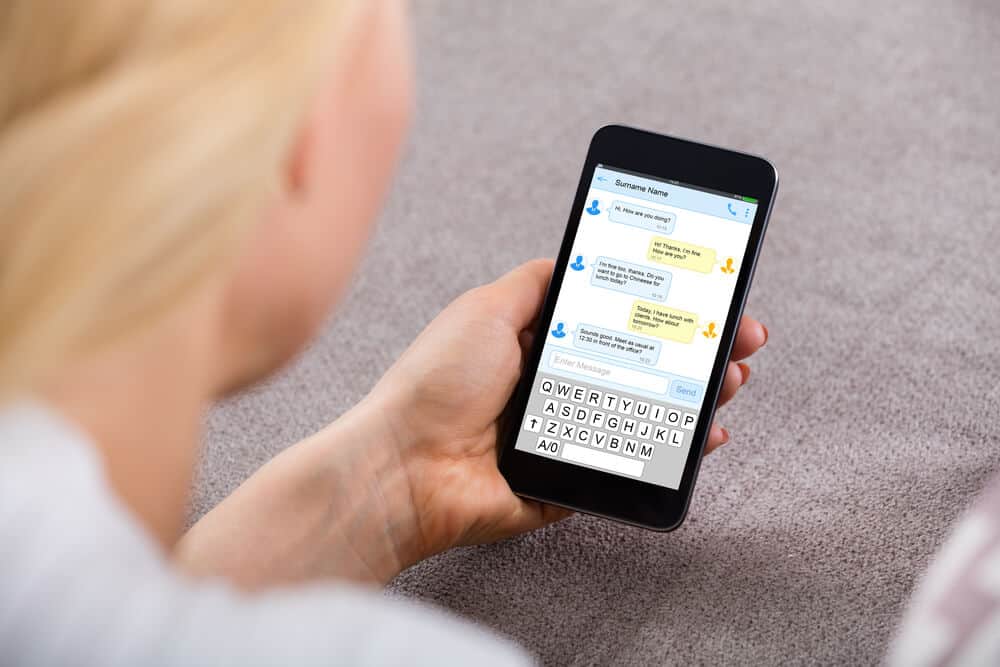 woman texting with a man