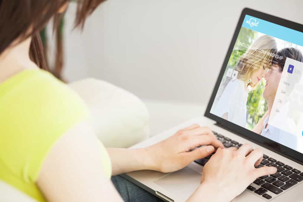 woman using an online dating website