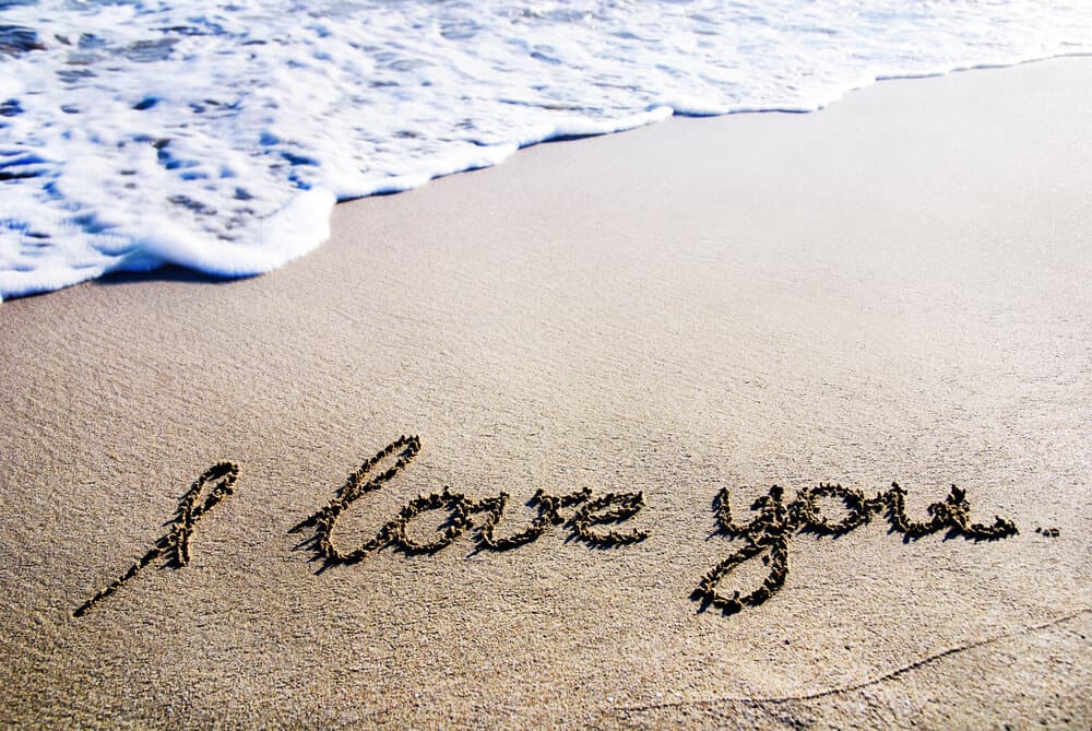 i love you written in the sand
