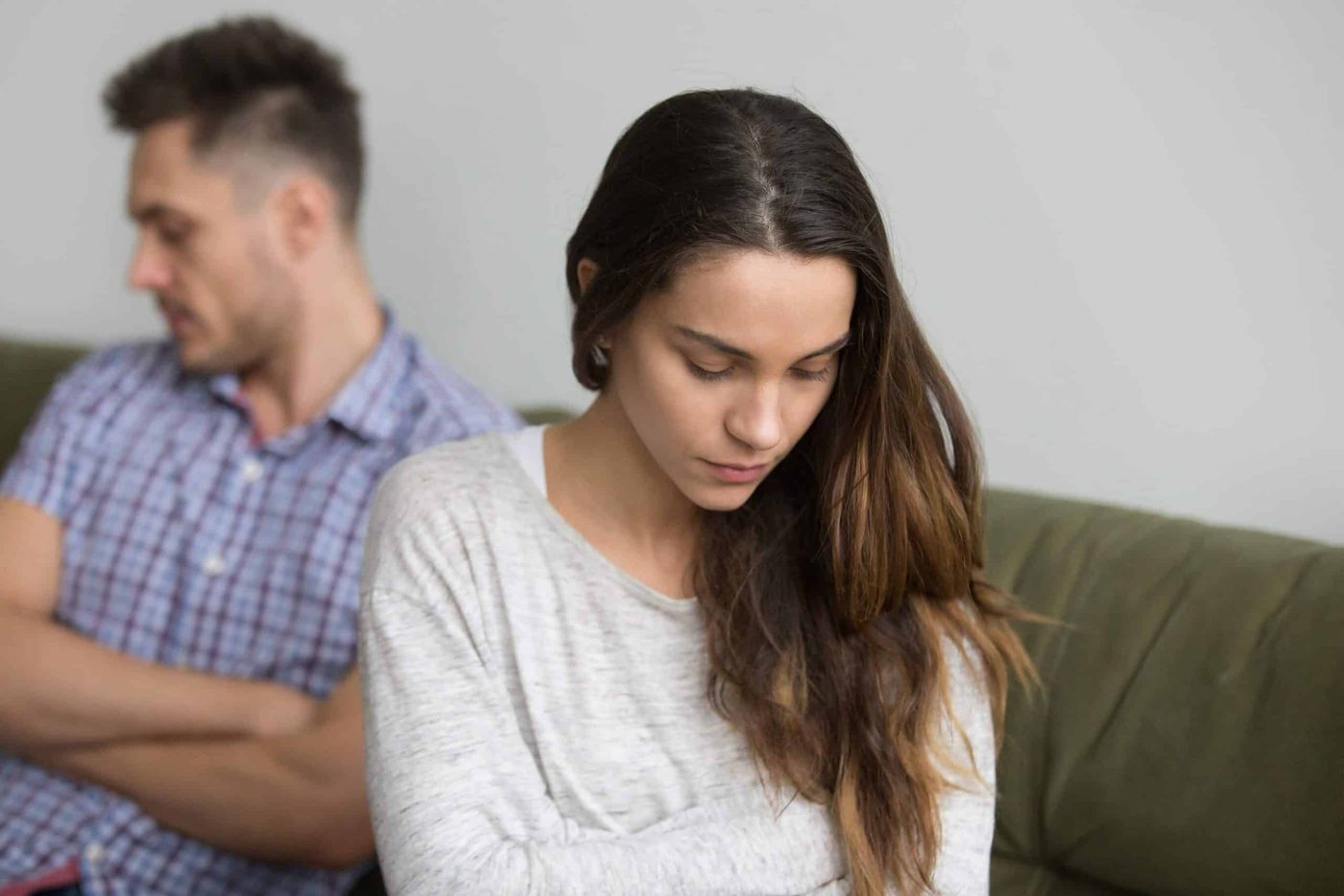 Woman turn back to man looking frustrated
