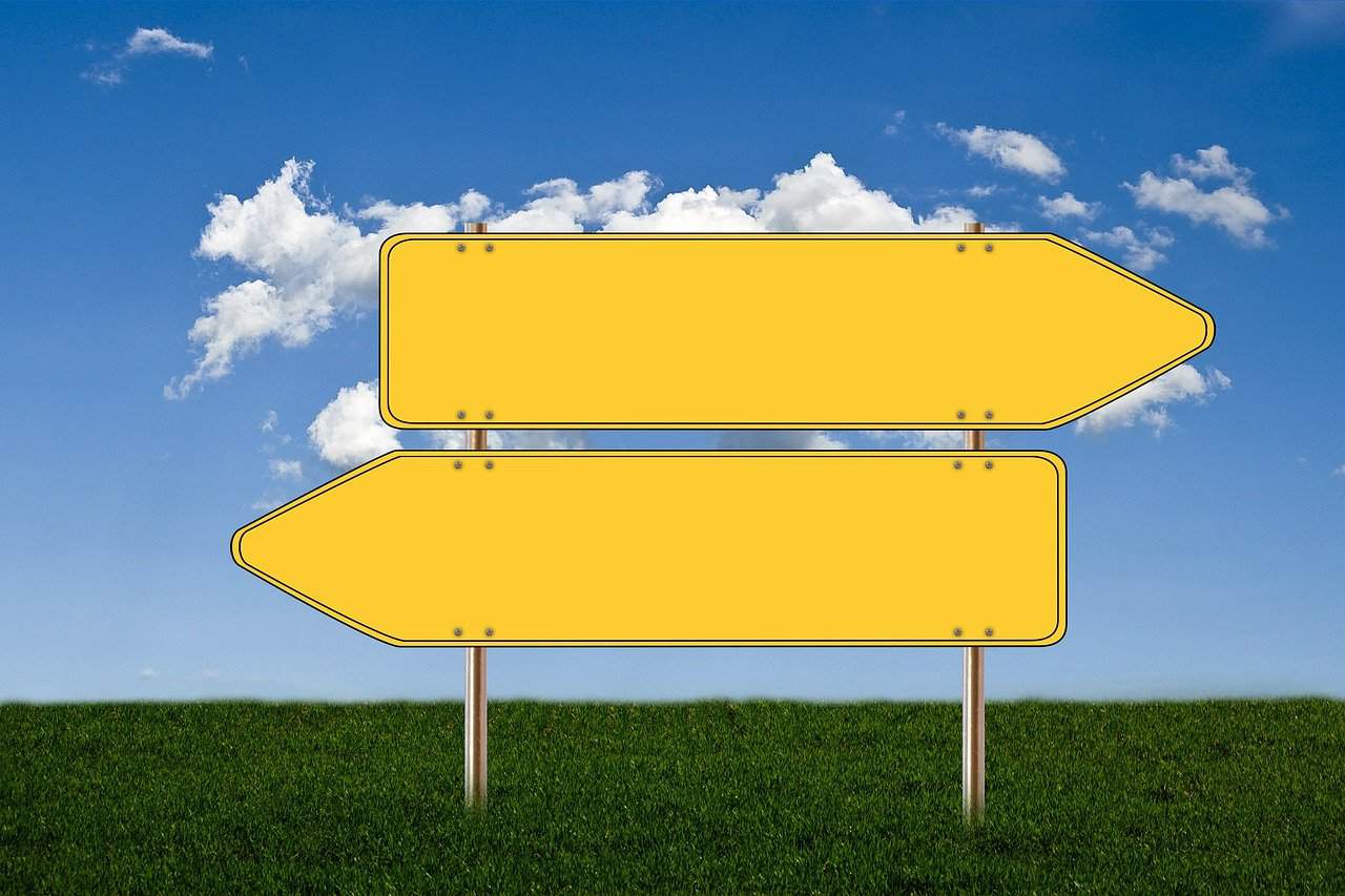 Road signs pointing at opposite directions