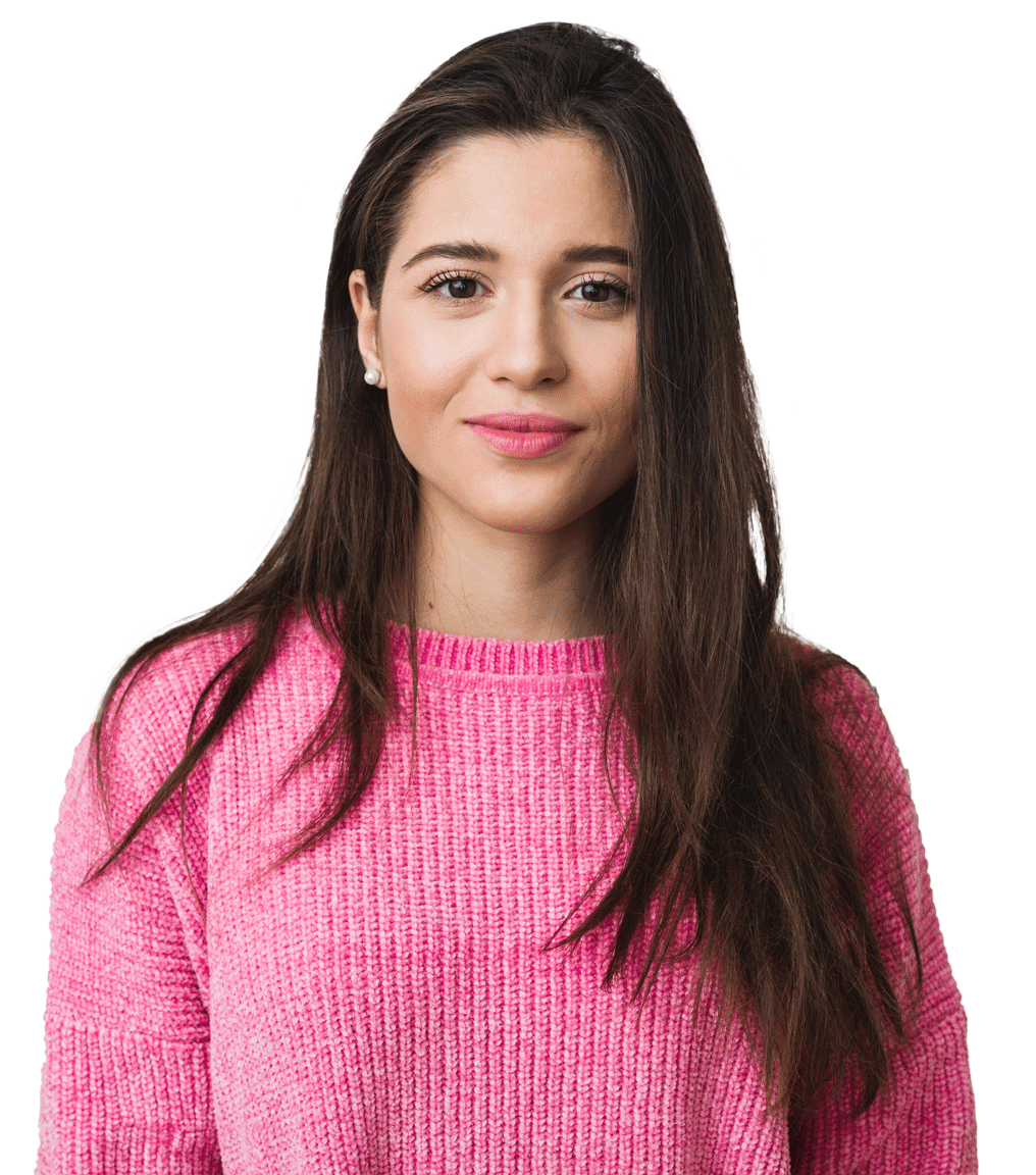 brunette Woman in Pink sweater standning