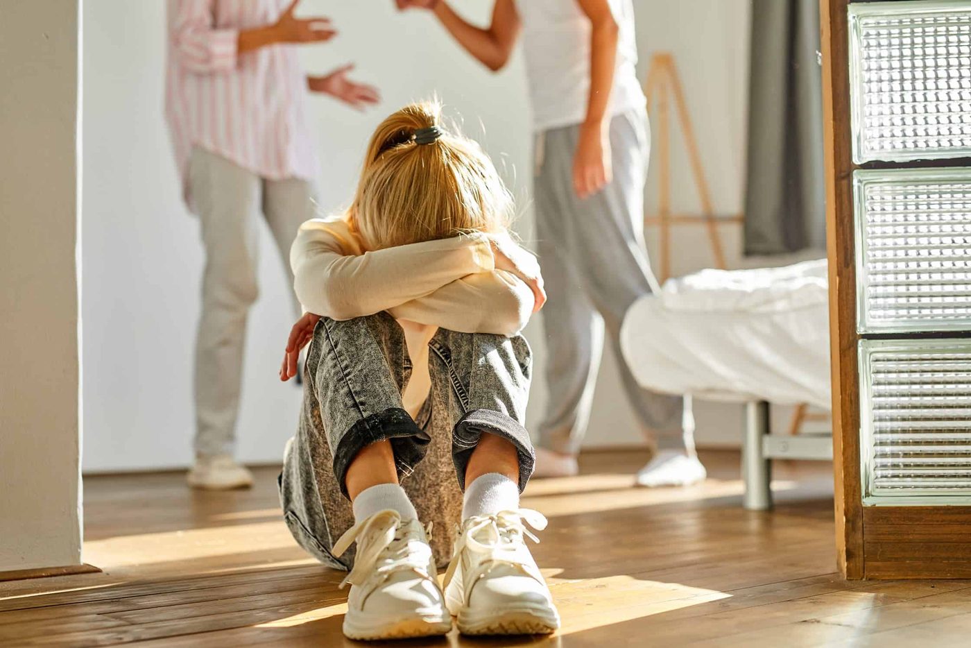 sad girl daughter suffering from parents argue