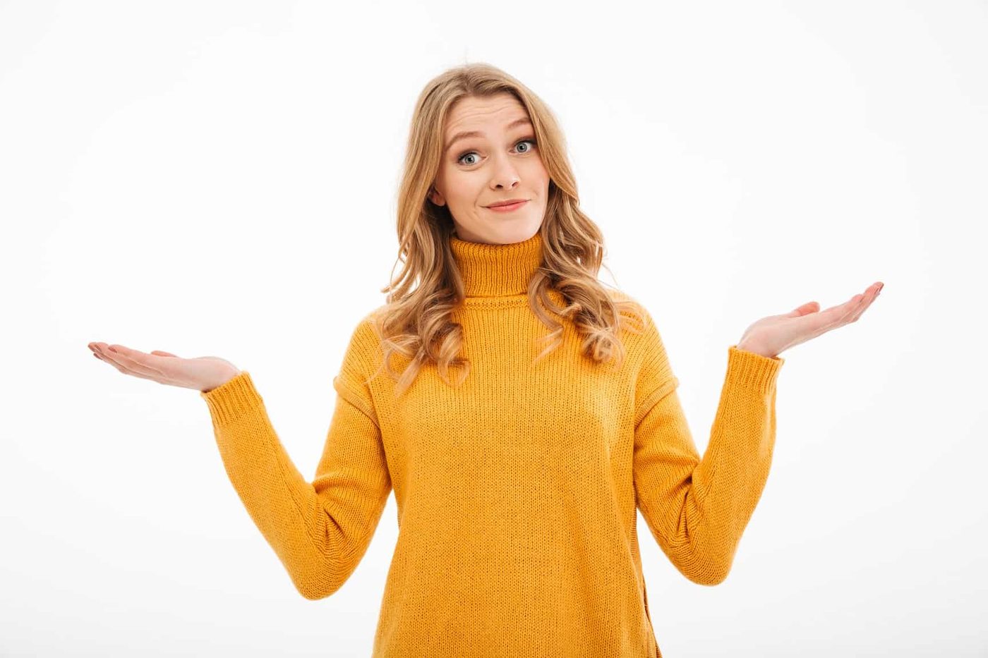 confused young lady standing isolated over white background