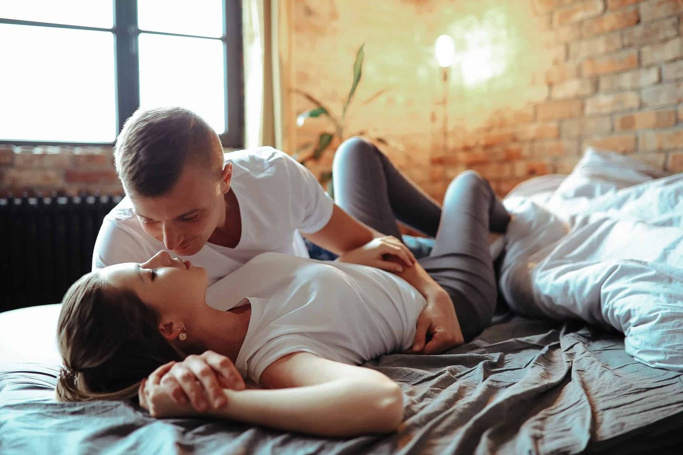 couple on bed intimate