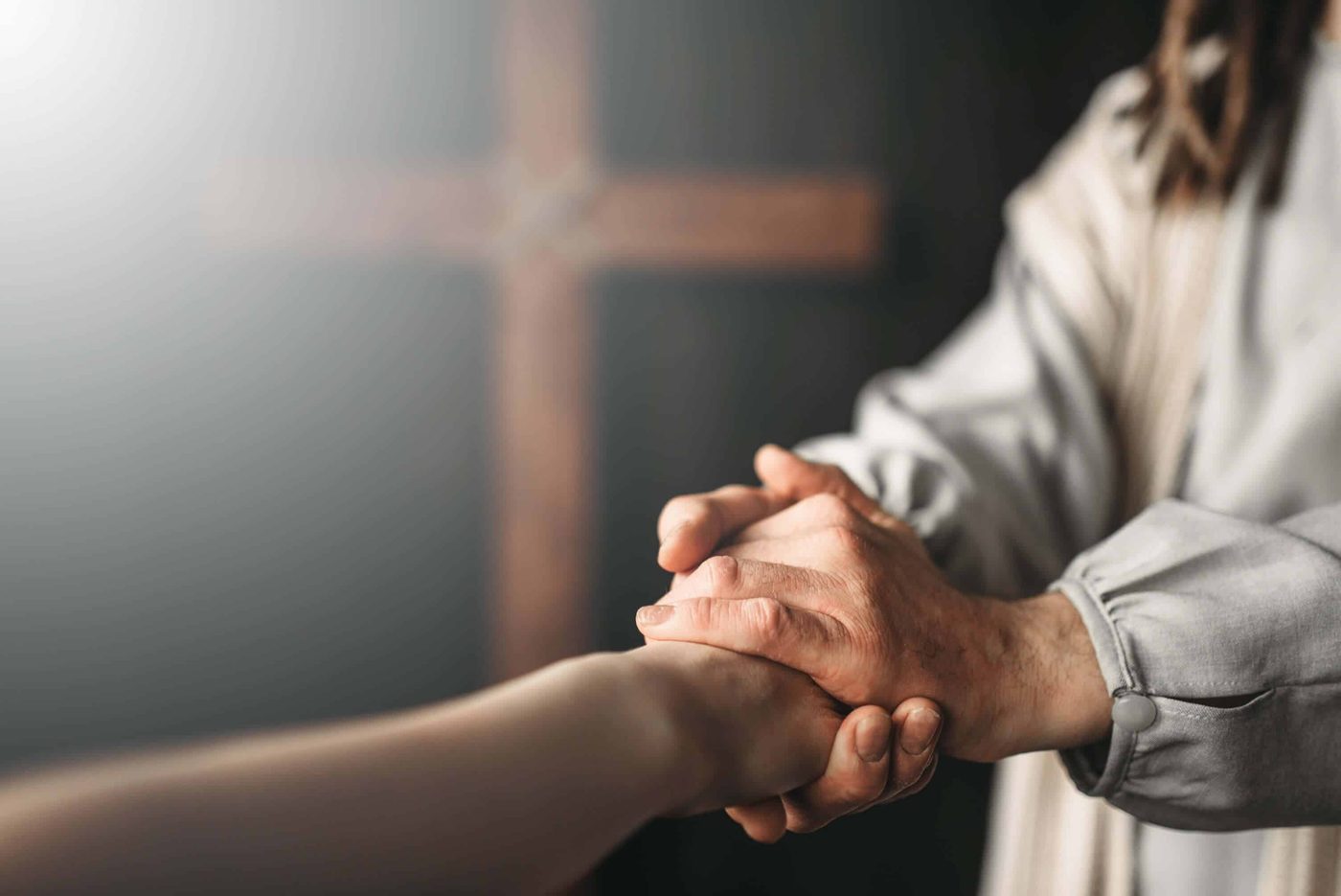 couple hold hands show forgivness